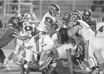  ?? TERRY/THE OKLAHOMAN ?? Jenks’ Jaiden Carroll runs for a touchdown during a 35-14 win at Edmond Santa Fe on Thursday. Carroll rushed for 190 yards with three touchdowns and a two-point conversion. BRYAN