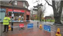  ?? File photo ?? ON GUARD: A police officer guards a cordoned off area in the city centre where former Russian intelligen­ce officer Sergei Skripal and his daughter were found poisoned, in Salisbury, Britain.-