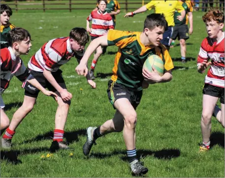  ??  ?? Action from the West Munster U-14 Plate Final that was won by Rugbaí Corcha Dhuibhne
