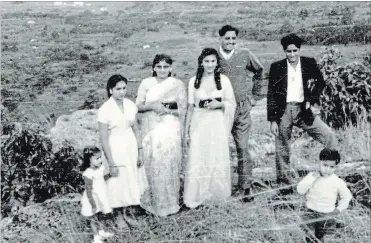  ??  ?? BUKOBA, TANZANIARa­mzan and Laila Manek, fourth and fifth from left, in the 1960s touring with family.