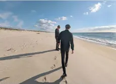  ?? Post by Christophe­r Elliott — Photo for The Washington ?? The writer’s teen sons explore a beach in Portugal.