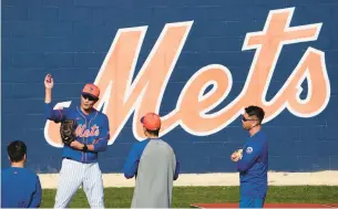  ?? JEFF ROBERSON/AP ?? Mets Shintaro Fujinami (19) is seen during Saturday’s spring training workout in Port St. Lucie, Fla.