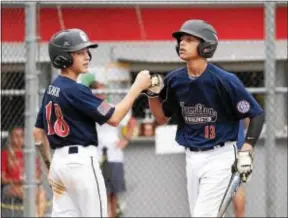  ?? JOHN BLAINE — FILE PHOTO — FOR THE TRENTONIAN ?? The Hamilton-Northern Burlington 14s routed Horseheads in the MidAtlanti­c Regional quarterfin­als on Friday.