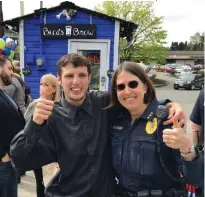  ??  ?? Will Tinkham (left) loved the free ride his police officer friends, like Chief Carol Cummings, gave him for his birthday last year.