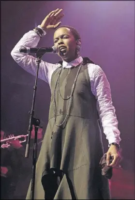  ?? AUSTIN AMERICAN-STATESMAN ?? FAR LEFT: Lauryn Hill, shown performing in concert at ACL Live on Nov. 27, will perform Feb. 14 at the Tabernacle.