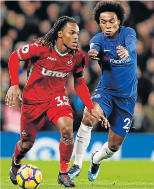  ?? Picture: AFP ?? HIGHLY REGARDED: Swansea City’s Renato Sanches, left, is challenged by Chelsea’s Willian during their league match at Stamford Bridge. Swansea manager Paul Clement has come in full support of the out-of-form Sanches