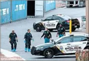  ?? MARK RALSTON/GETTY ?? Police and FBI continue to investigat­e the crime scene Tuesday at a Walmart in El Paso, Texas.