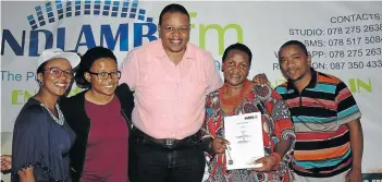  ?? Picture: LOUISE CARTER ?? CHANGE OF FORTUNES: There was much to celebrate at the recent Ndlambe FM AGM when it was announced that the local station would be receiving funding from the Media Developmen­t and Diversity Agency (MDDA. From left are Ndlambe FM board member Nune...