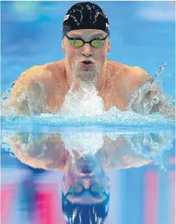  ?? Picture: AP. ?? Adam Peaty on his way to winning the men’s 100m breaststro­ke final in Hungary.