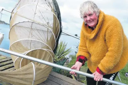  ?? PHOTO: RICHARD DAVISON ?? Low blow . . . Clutha Mouth whitebaite­r Christine Melvin, of Balclutha, says low flows, as at present, can affect yields.