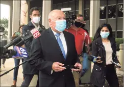  ?? Ned Gerard / Hearst Connecticu­t Media file photo ?? Former Bridgeport Police Chief Armando Perez makes a statement in front of the Federal Courthouse in Bridgeport on Oct. 5, 2020. Perez pleaded guilty to conspiracy to commit wire fraud and lying to the FBI.