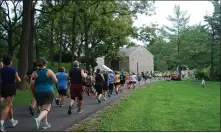  ??  ?? More than 100runners make their way to the Union Canal Trail during the 13th annual Run4Sam 4-mile run on Sunday, Aug. 15.