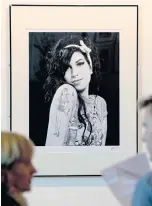  ??  ?? A portrait of Amy Winehouse at the Proud gallery in Camden, London.