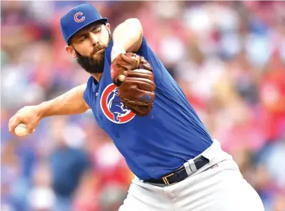  ??  ?? Jake Arrieta had another solid performanc­e, allowing only one unearned run in 5⅔ innings Thursday against the Reds. | GETTY IMAGES