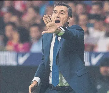  ?? FOTO: PERE PUNTÍ ?? Ambos técnicos dieron por bueno el espectácul­o que ofrecieron Atlético de Madrid y Barça