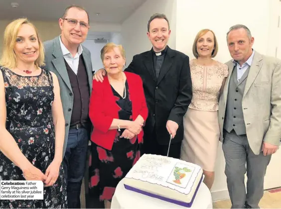  ??  ?? Celebratio­n Father Gerry Maguiness with family at his silver jubilee celebratio­n last year