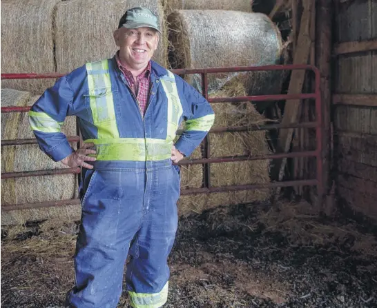  ?? RYAN TAPLIN ■ THE CHRONICLE HERALD ?? Tim Marsh, president of the Nova Scotia Federation of Agricultur­e, inside one of the barns on his Poplar Grove farm on Aug. 19, 2021.