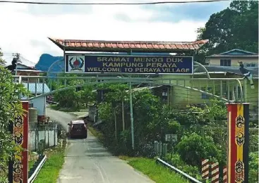  ?? ?? The main gateway to Kampung peraya.