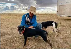  ??  ?? Emily Landsberg with her working dogs in Queensland.