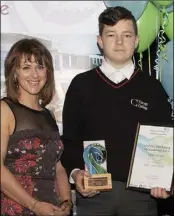  ??  ?? Merit Award winner Nathan Bolton of Creagh College, for East Coast Books, with Emer Doyle, Project Coordinato­r, LEO.