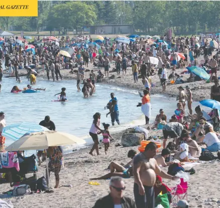  ?? FRANK GUNN/THE CANADIAN PRESS ?? A beach in Toronto last month. Lockdown fatigue and feelings of invincibil­ity may be prompting young people to flout social distancing rules.