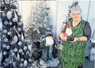  ?? PHOTO/STUART MUNRO ?? Jenny and last year’s Granny’s Christmas Grotto.