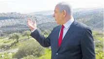  ?? Photo / AP ?? Israeli Prime Minister Benjamin Netanyahu visits the site of a new neighbourh­ood in the East Jerusalem settlement of Har Homa.