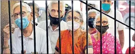  ??  ?? Senior citizens wait for their turn to get vaccinated at a BMC hospital in Mumbai.