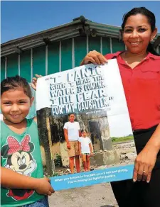  ??  ?? Miriam Maribel Campos Pérez and her daughter Maria, from a coastal village that faces regular flooding in Honduras, feature on the 2017 Trócaire box. Photo: Frank McGrath