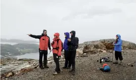  ??  ?? Above: Our guide Sondre points out features from the Keiservard­en summit above Bodø.