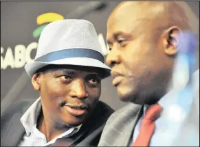  ?? Isithombe: ITUMELENG ENGLISH ?? IBHODI le-SABC lifuna bangayitho­li impesheni yabo oMnuz Hlaudi Motsoeneng noMnuz James Aguma abasolwa ngokuthath­a izinqumo ezalahleki­sela i-SABC ngemali