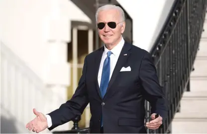  ?? ANNA MONEYMAKER/GETTY IMAGES ?? President Biden arrives back at the White House on Dec. 2 after announcing new steps to combat COVID-19.