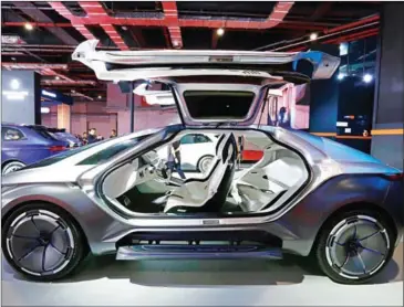  ?? AFP/STRINGER ?? A Singulato concept car is displayed during the first day of the 17th Shanghai Internatio­nal Automobile Industry Exhibition in Shanghai on Wednesday. Many carmakers are looking for ways to break into the Southeast Asian market as economic growth in...