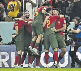  ?? AFP ?? La selección portuguesa saldó con una goleada sin paliativos su pase a cuartos |