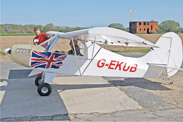  ?? ?? Guy Gratton, associate professor of aviation at Cranfield University, took the controls for the milestone inaugural flight of the one-seater Sherwood ekub over Little Snoring in Norfolk