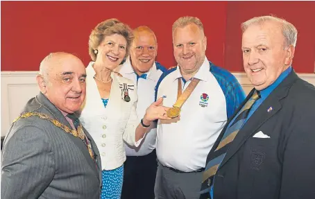  ?? Picture: Gareth Jennings. ?? Bowlers Darren Burnett (with gold medal) and Mike Nicoll with Provost Ronnie Proctor, Lord Lieutenant Georgiana Osborne and Deputy Provost Colin Brown.