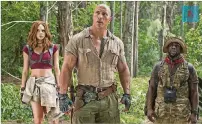  ?? FRANK MASI / SONY PICTURES ?? Karen Gillan (from left), Dwayne Johnson and Kevin Hart in a scene from the movie “Jumanji: Welcome to the Jungle,” which will be shown Friday during Screen on the Green on the West Palm Beach Waterfront.
