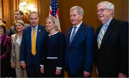  ?? J. SCOTT APPLEWHITE/AP ?? The Senate leaders from both parties flanked the leaders of Sweden and Finland in Washington on May 19.