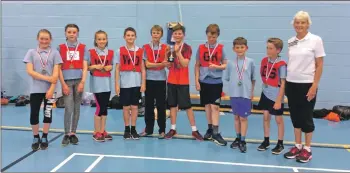  ??  ?? The winning Brodick team with their trophy.