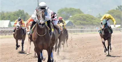  ?? FILE ?? Omar Walker aboard Barcelona winning the second race (Maiden Condition Race 3 year old Fillies) over 1100 metres at Caymanas Park on Saturday, April 28, 2018.