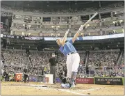  ?? MIKE EHRMANN - GETTY IMAGES ?? Aaron Judge tees off during the Home Run Derby on Monday. He slugged 47 homers in winning the event.