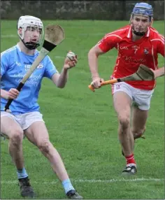  ??  ?? Seán Ryan of Graigue-Ballycalla­n is closed down by Rúairí Tubrid.