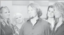  ?? Christophe­r DeVargas (2012) ?? Las Vegas’ Brown family — from left, Christine, Janelle, Kody, Robyn and Meri — is featured on the reality TV show “Sister Wives.”