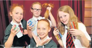  ??  ?? Enterprisi­ng St Stephen’s Primary School held an enterprise fair in June. Pictured are beautician­s Ruthee Menmuir, Kaitlyn Clark and Sophie Corke with customer Alana Gruneberg-Mackenzie