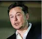  ??  ?? Tesla CEO and founder of the Boring Company Elon Musk speaks June 14 at a news conference in Chicago. Musk says he is considerin­g taking the electric car maker private.