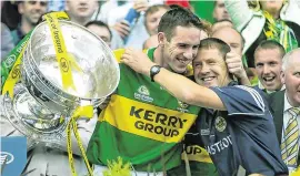  ??  ?? Jack O’Connor (right) celebrates with Kerry captain Declan O’Sullivan after guiding the Kingdom to the 2009 All-Ireland SFC title