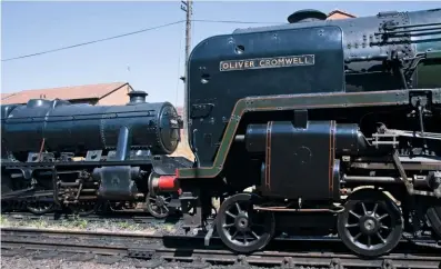  ?? NICK BRODRICK/SR ?? Two Midland Region veterans came face to face at Loughborou­gh in July. ‘8F’ No. 48624 has had its boiler certificat­e extended into next year, while Oliver Cromwell will bow out on December 31.