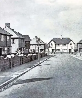  ?? ?? Below: New houses on Prince George Road, Park Lane Estate, Wednesbury. Prince George, younger brother of Edward, Prince of Wales, visited Wednesbury in April 1933 to take a look at the huge regenerati­on project that the town was undergoing.