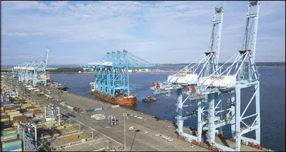  ?? AP ?? Photo shows a Chinese ship carrying giant cranes approaches the pier at Virginia Internatio­nal GatewayTer­minal in Portsmouth, Va.