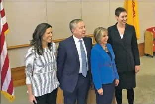  ?? Andrew Oxford/The New Mexican ?? Gov.-elect Michelle Lujan Grisham, second from right, chose Olivia Padilla-Jackson, from left, to head the Department of Finance and Administra­tion, Dr. David Scrase to lead the Human Services Department and Sarah Cottrell Propst to manage the Energy, Minerals and Natural Resources Department.